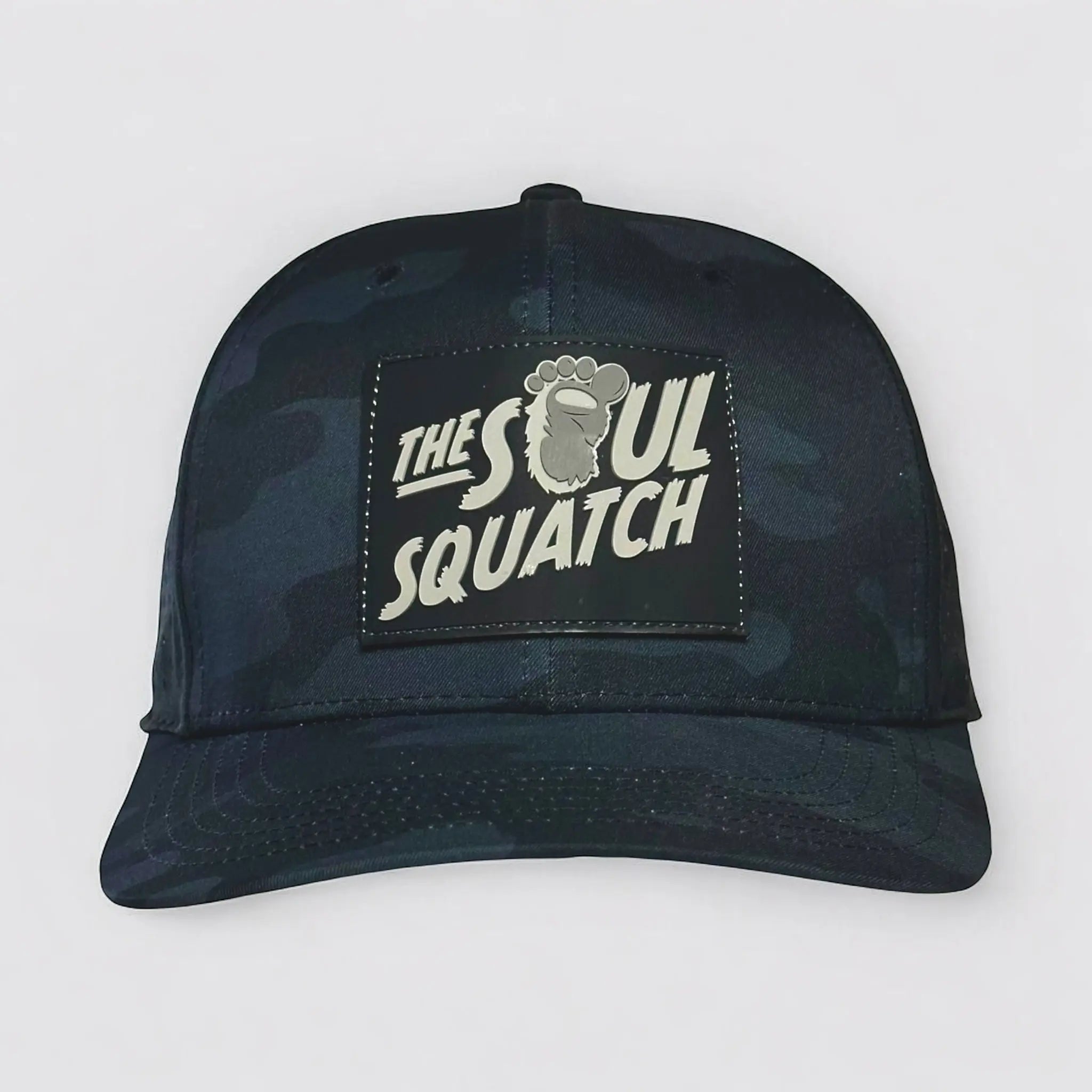 The Soul Squatch Pathfinder Mid-Profile Hat in Dark Camo – stealthy and rugged headwear for nature lovers and Sasquatch chasers.