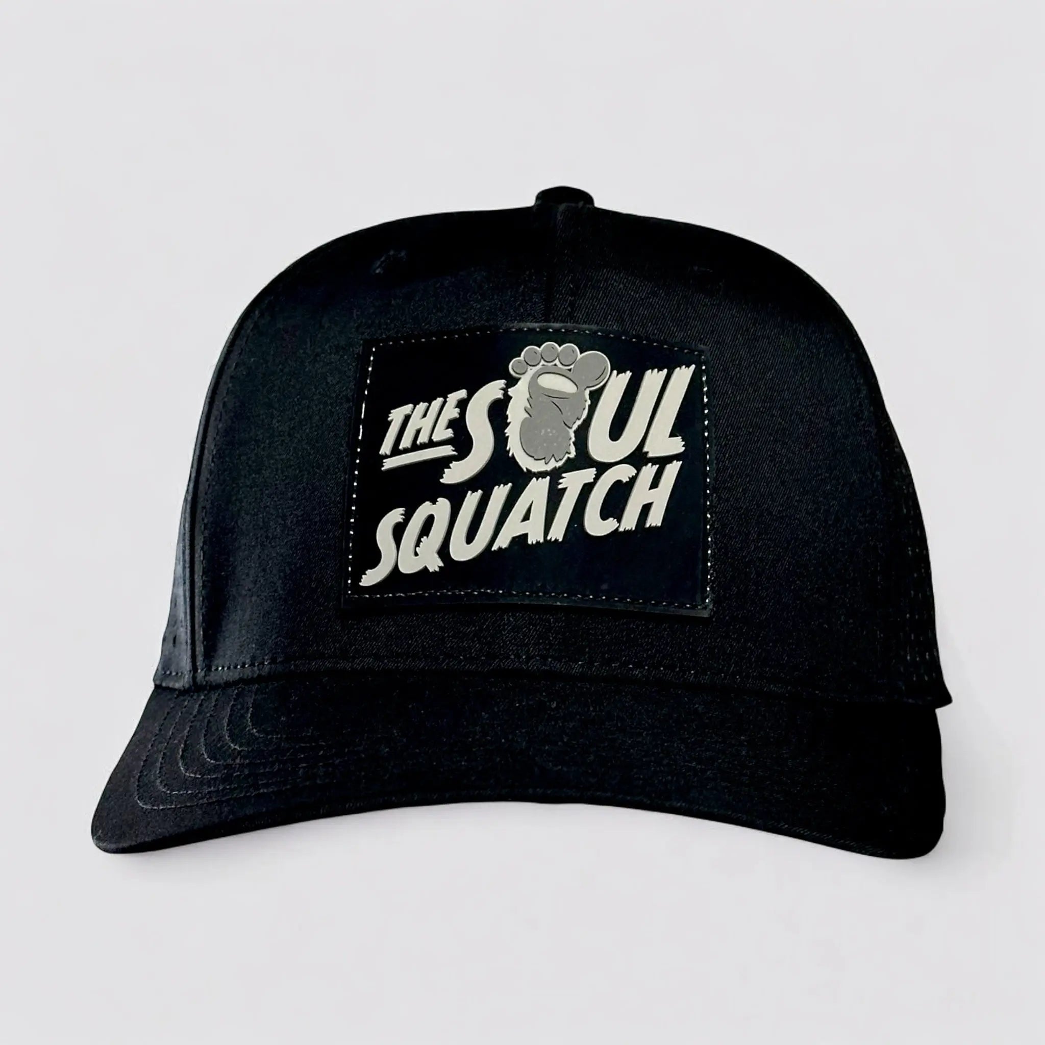 The Soul Squatch Pathfinder Mid-Profile Hat in Black – breathable, adventure-ready cap for campers, hikers, and Bigfoot believers.